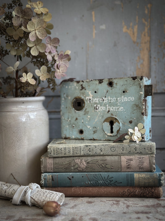 An Antique Lock With Hand Painted Quote