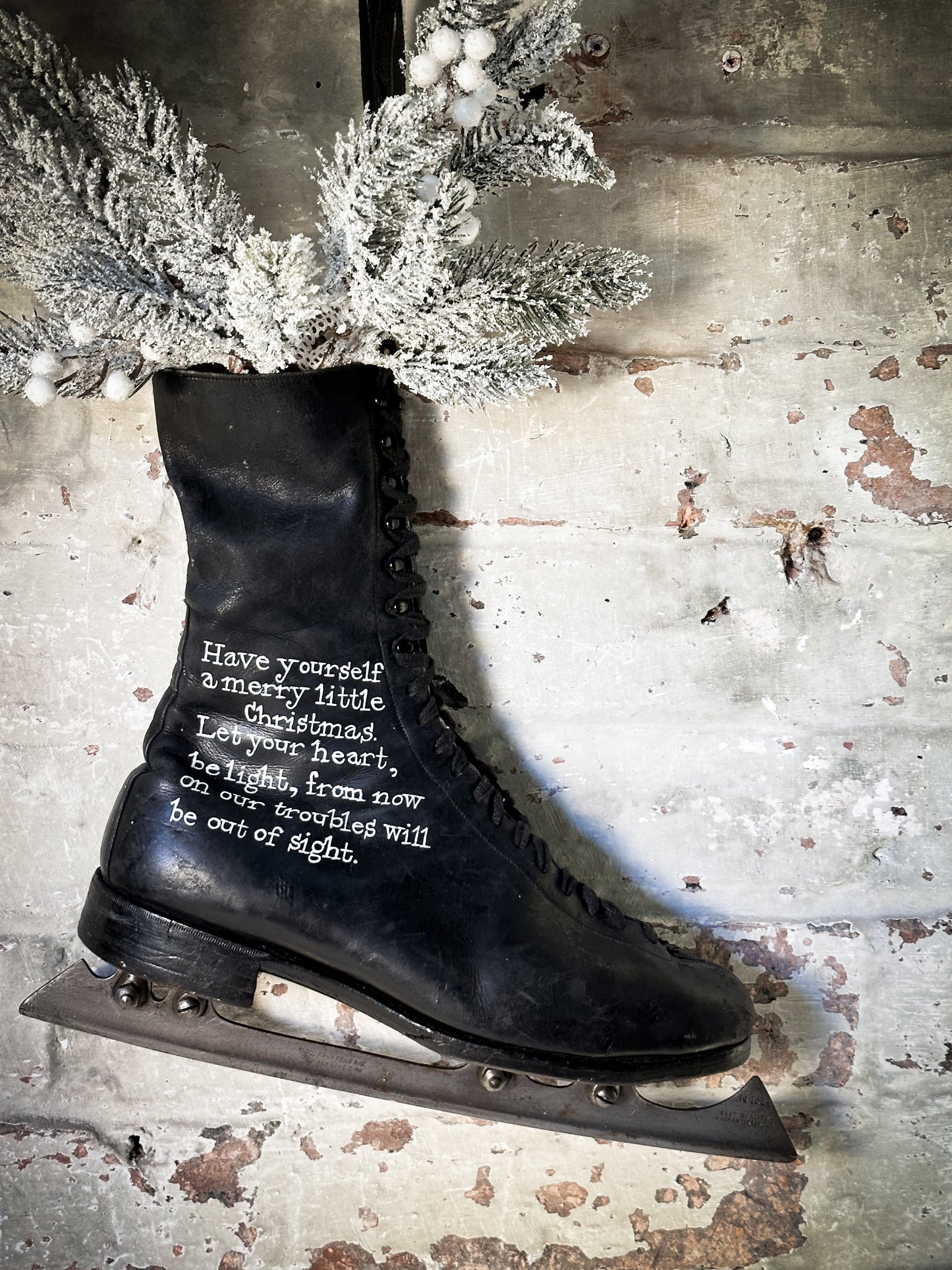 A beautiful vintage Christmas ice skate hand painted using traditional sign writer’s techniques and materials