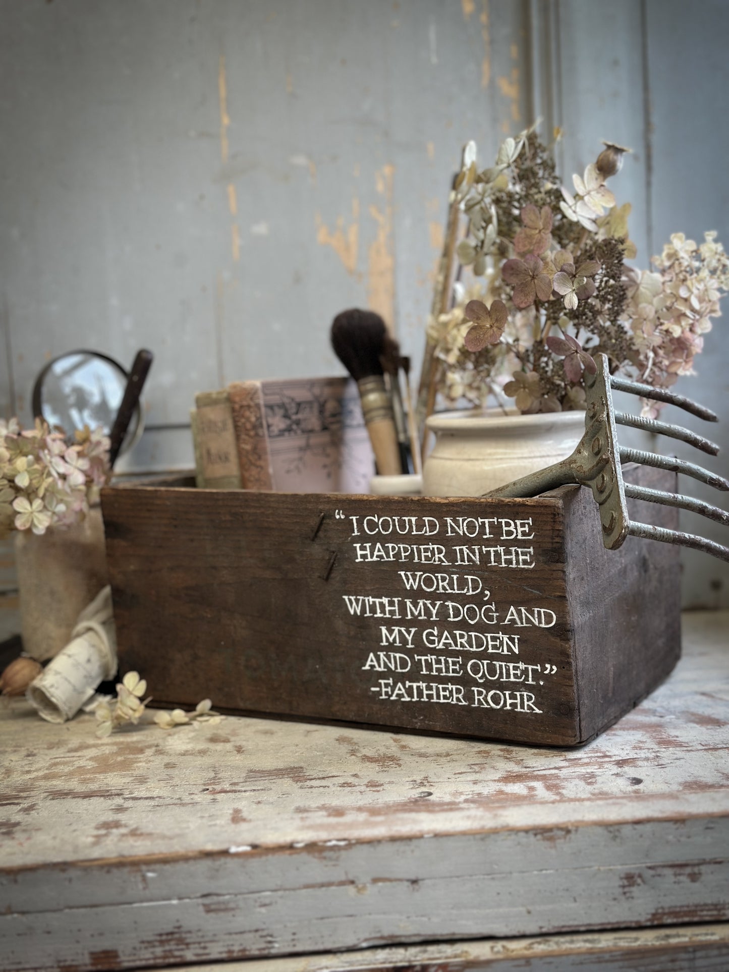 A Vintage Wooden Tomato Crate With Hand Painted Quote