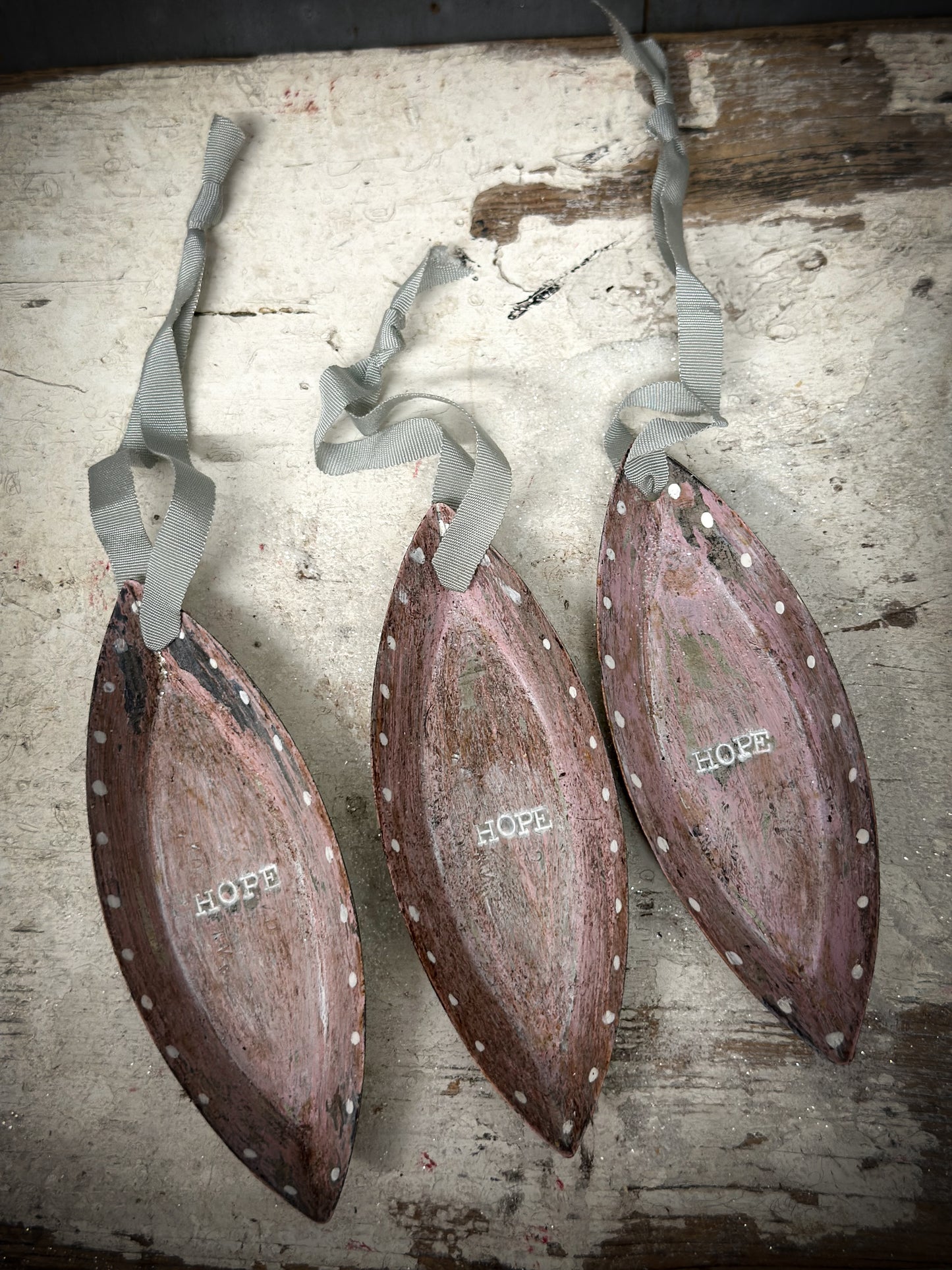 A Reworked French Patisserie Tin Christmas Decoration Stamped and Painted “Hope”