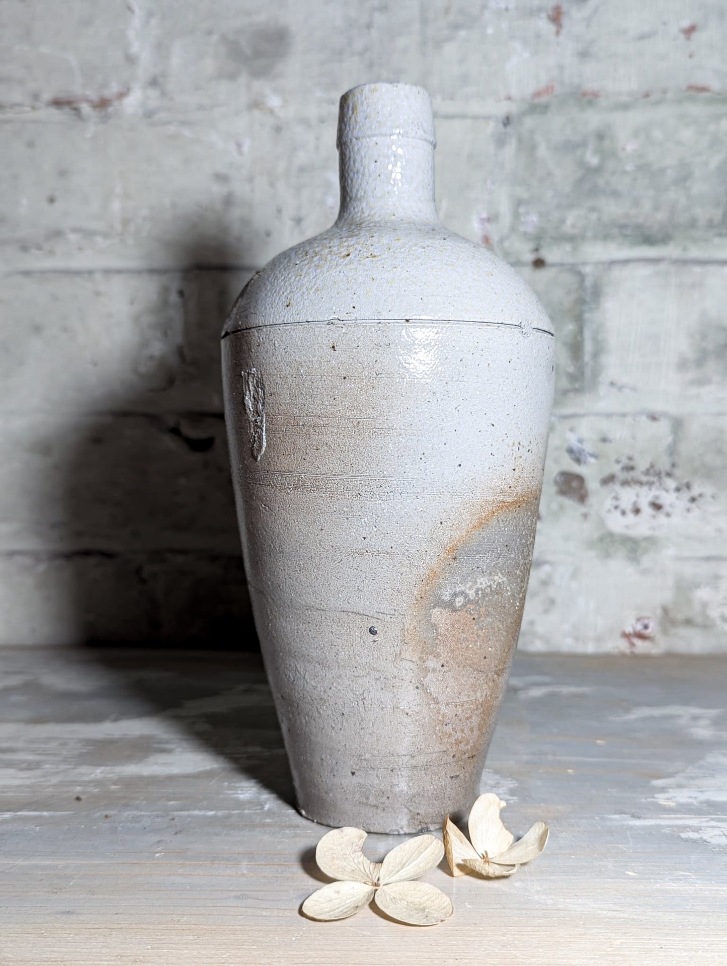 A lovely Primitive French Antique White Pottery bottle