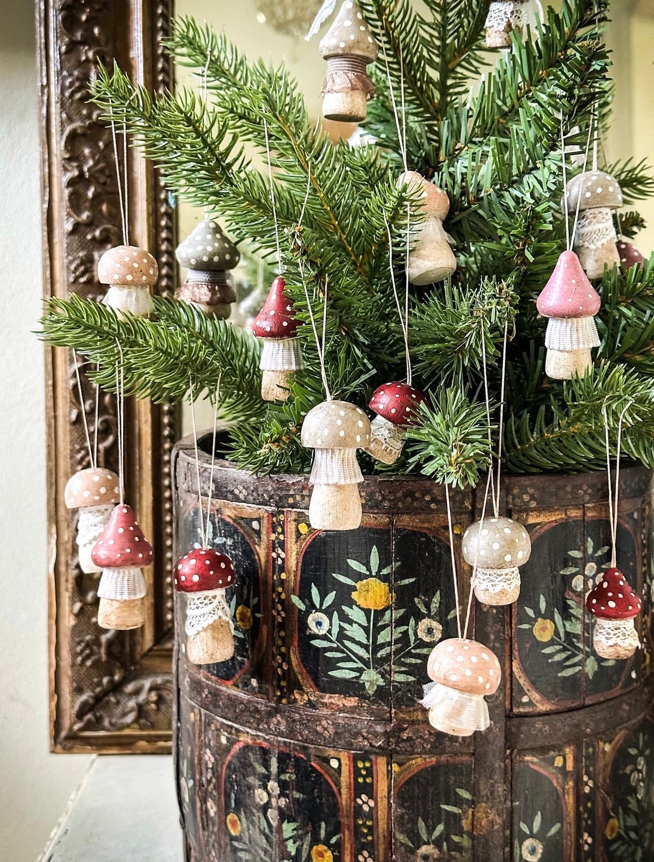 A wooden hand painted and trimmed Hanging Christmas tree toadstool