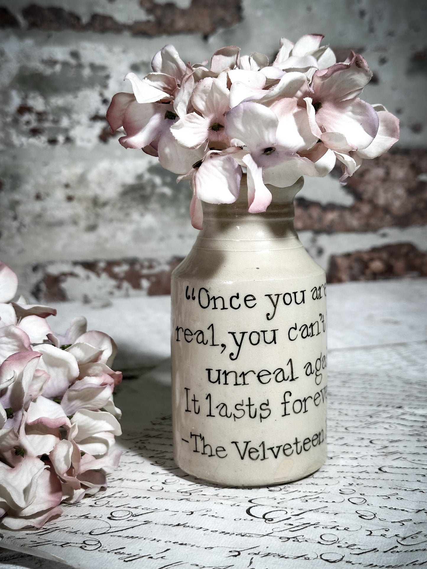 An Antique Bottle with a Hand Painted Inspirational Quote