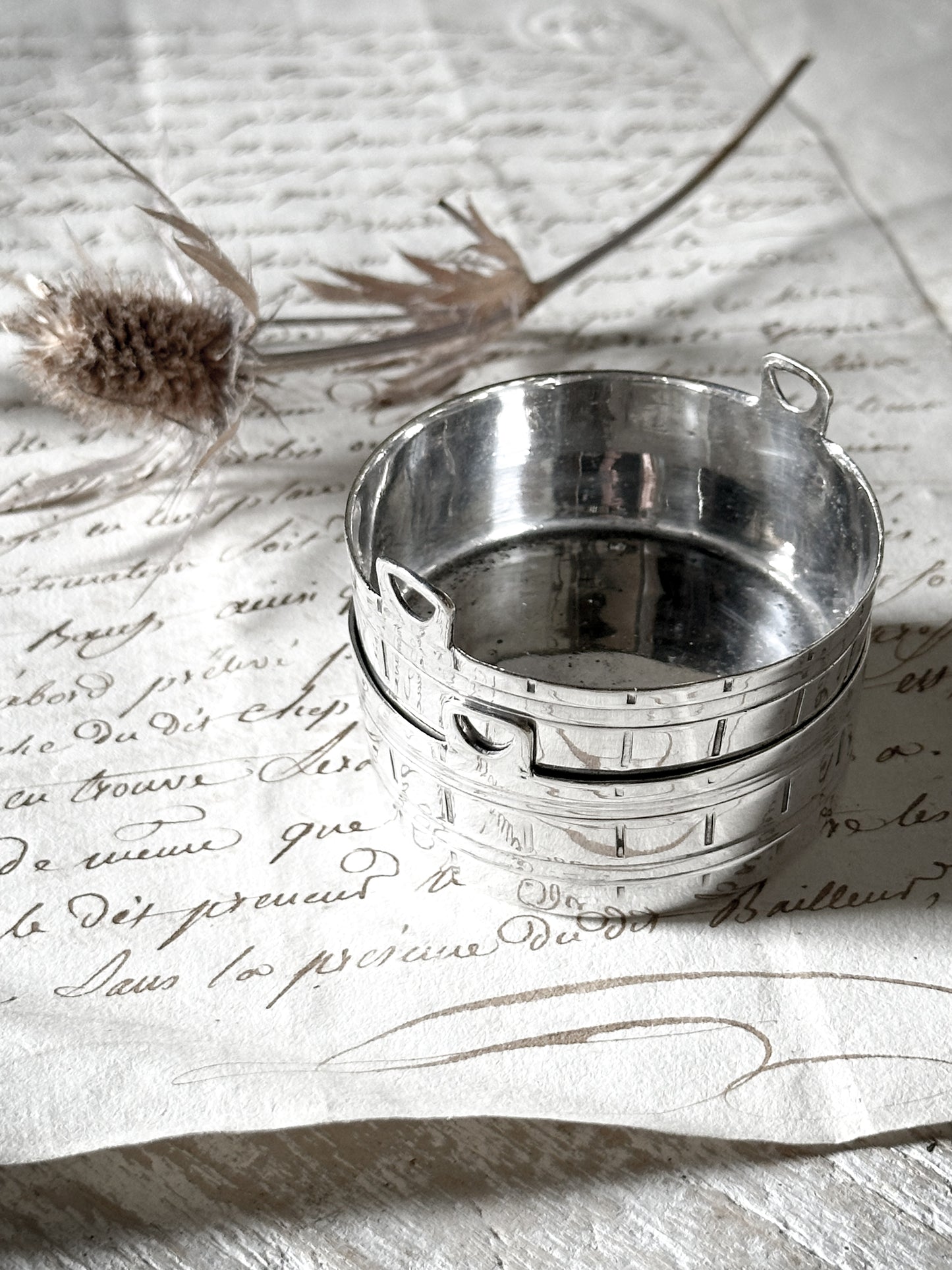 A pair of pretty silver plated mini churns