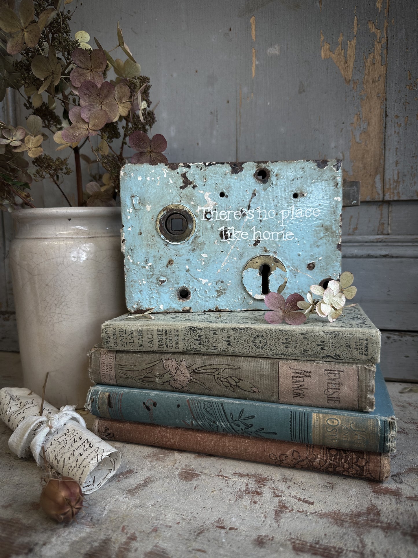 An Antique Lock With Hand Painted Quote