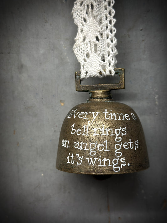 An Antique French Bell With Christmas Quote