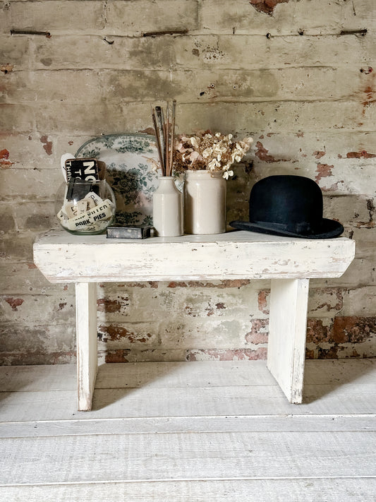 A lovely large chippy paint vintage bench or stool perfect for displays