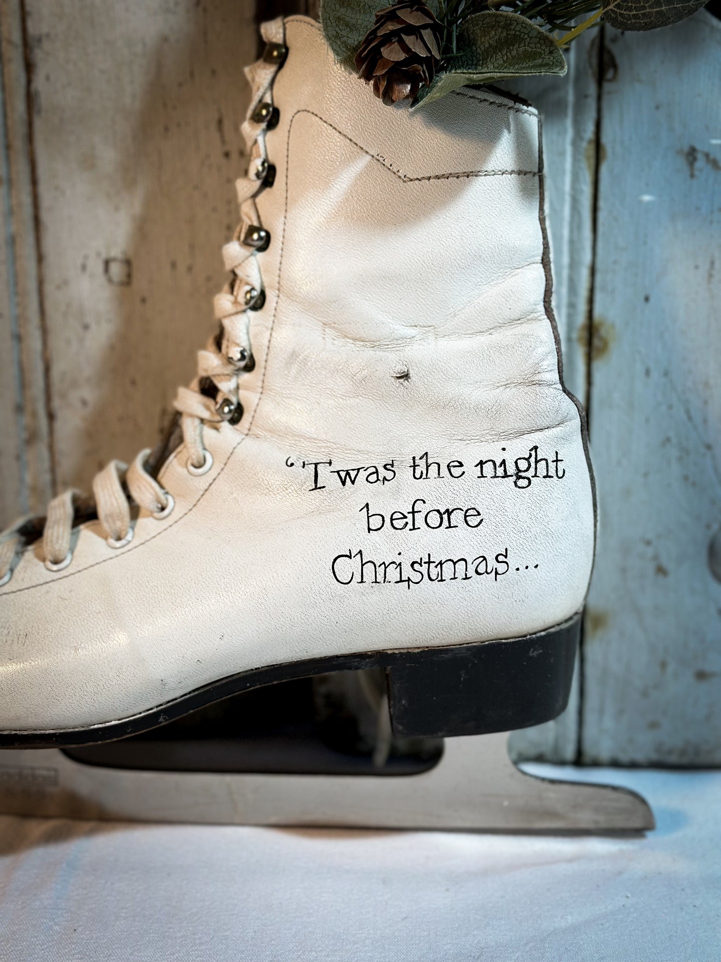 A beautiful vintage Christmas ice skate hand painted using traditional sign writer’s techniques and materials