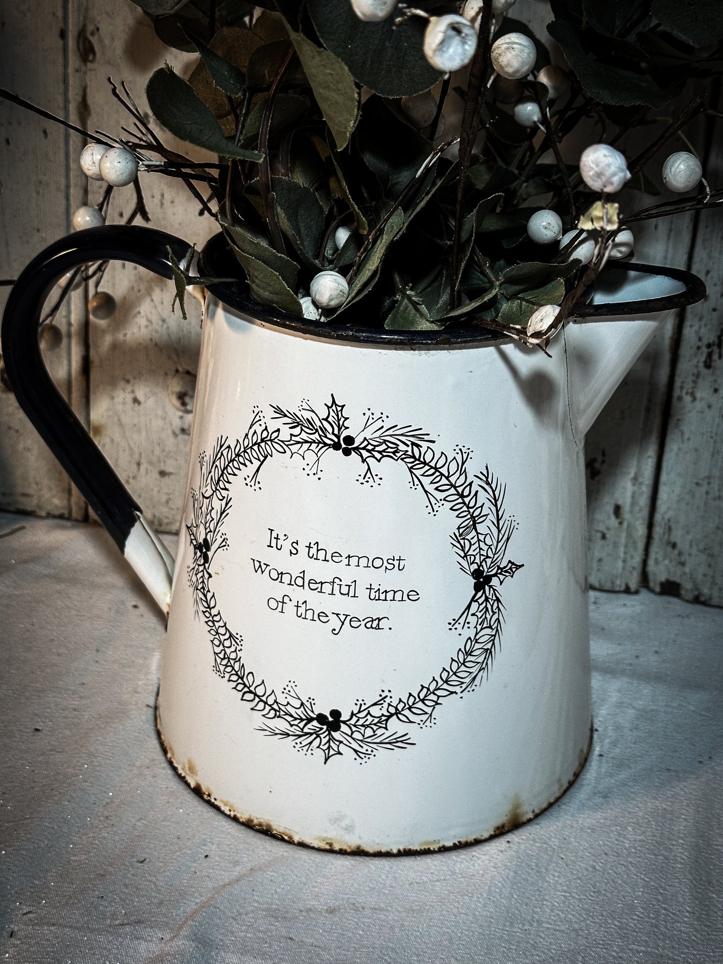 A hand painted quote on a beautiful Vintage white enamelware jug