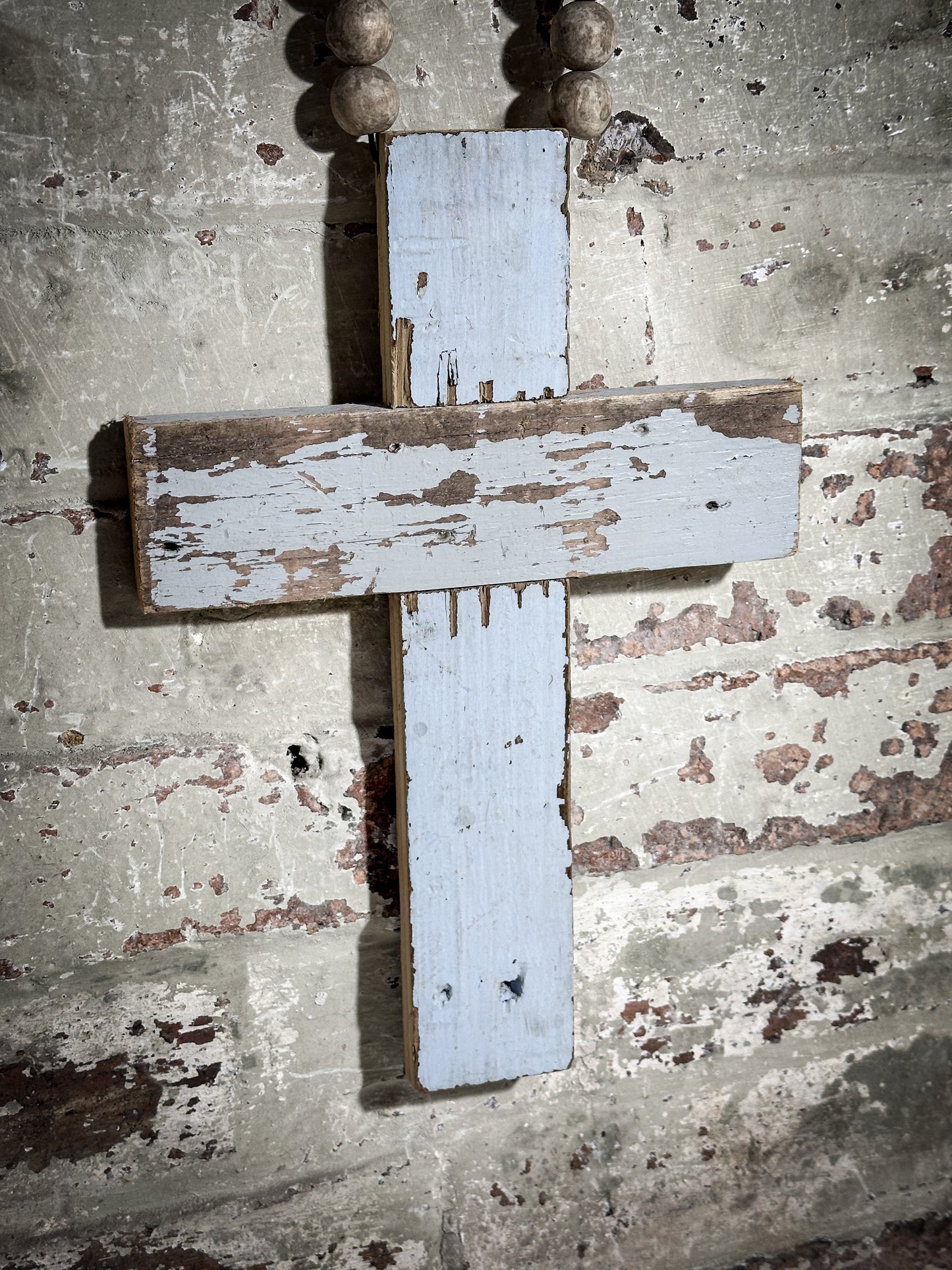 A beautiful hand made recycled wooden oversized crucifix or rosary