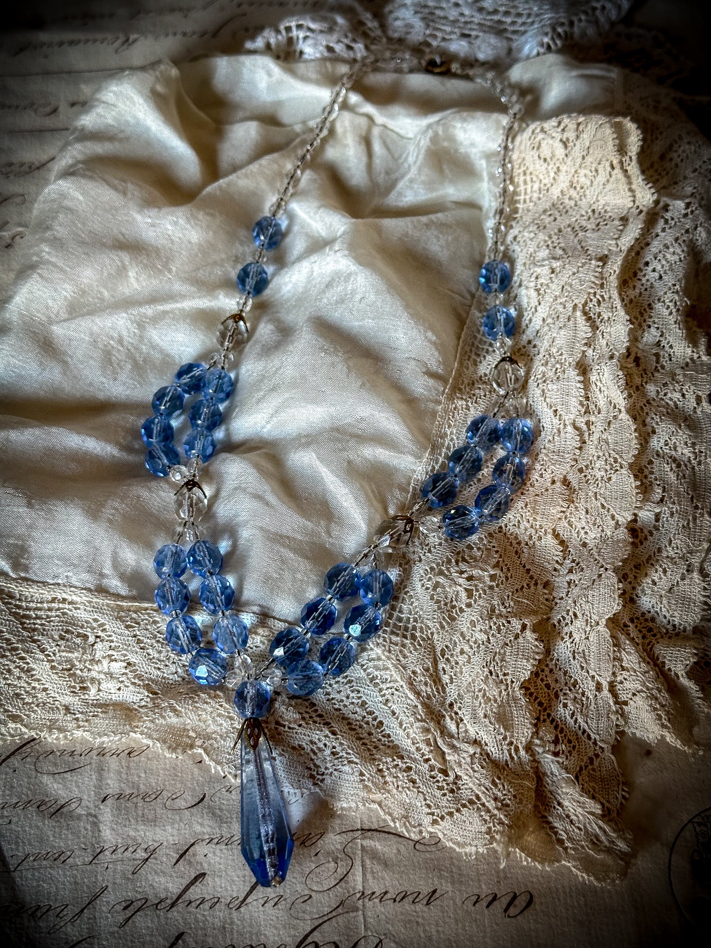A stunning antique Czech crystal blue and clear drop necklace