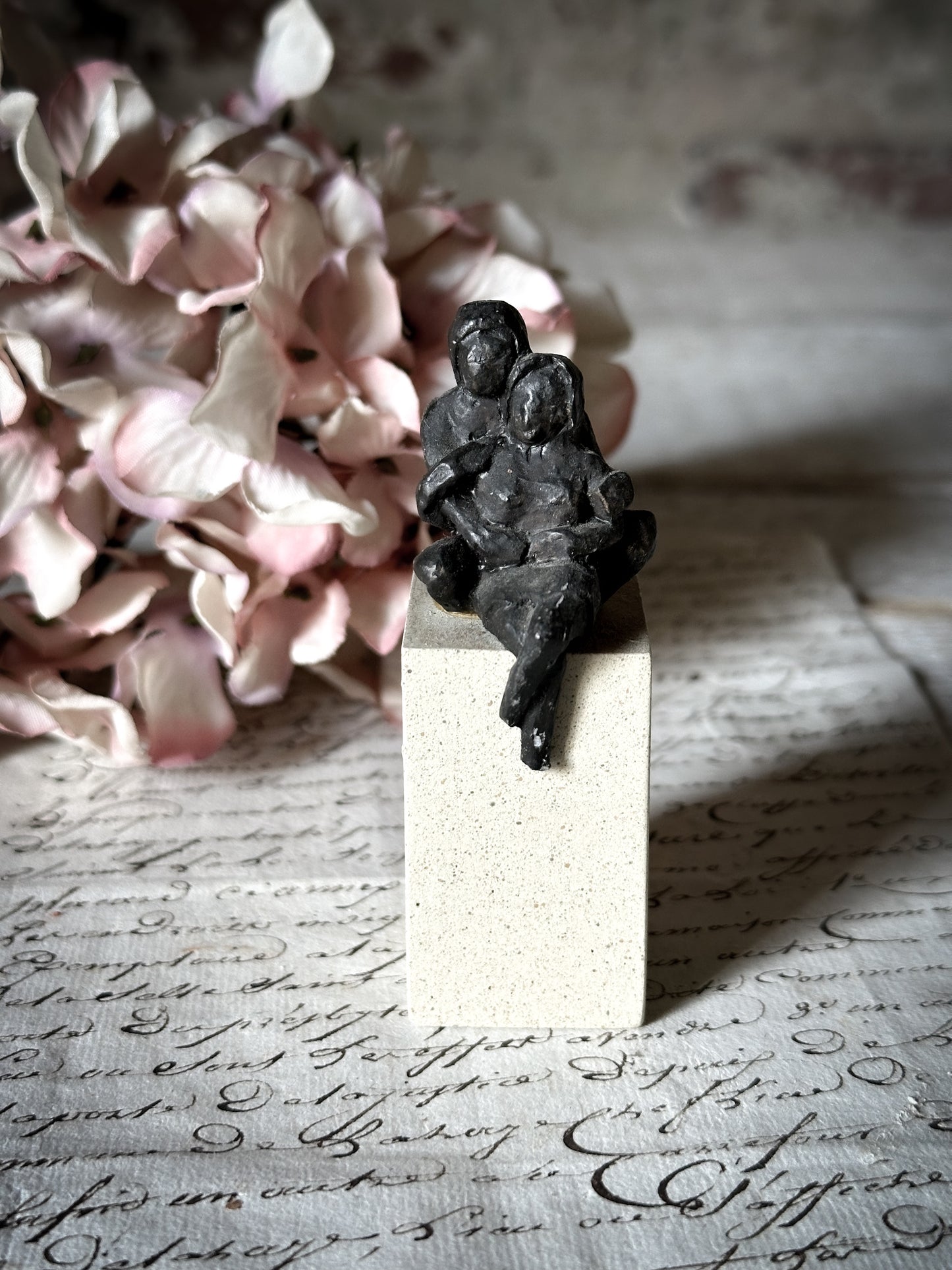 A Vintage Mini Sculpture of an Embracing Couple