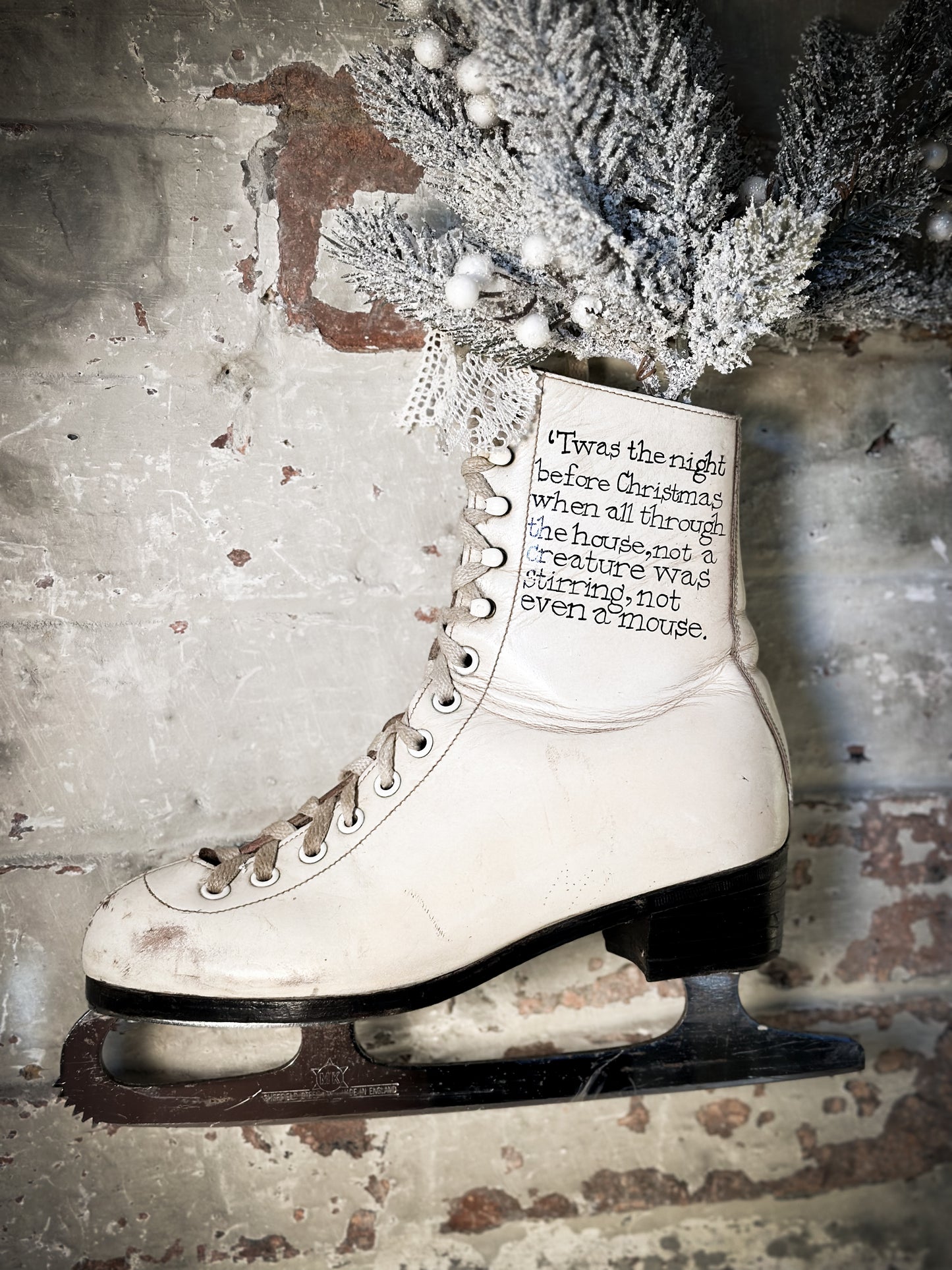 A beautiful vintage Christmas ice skate hand painted using traditional sign writer’s techniques and materials