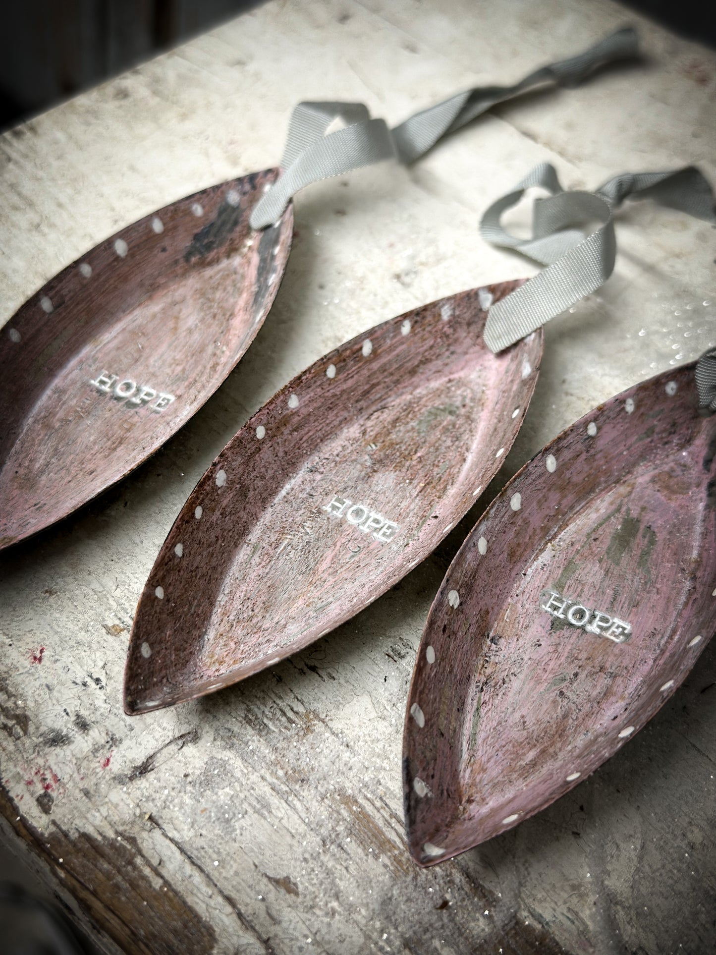 A Reworked French Patisserie Tin Christmas Decoration Stamped and Painted “Hope”