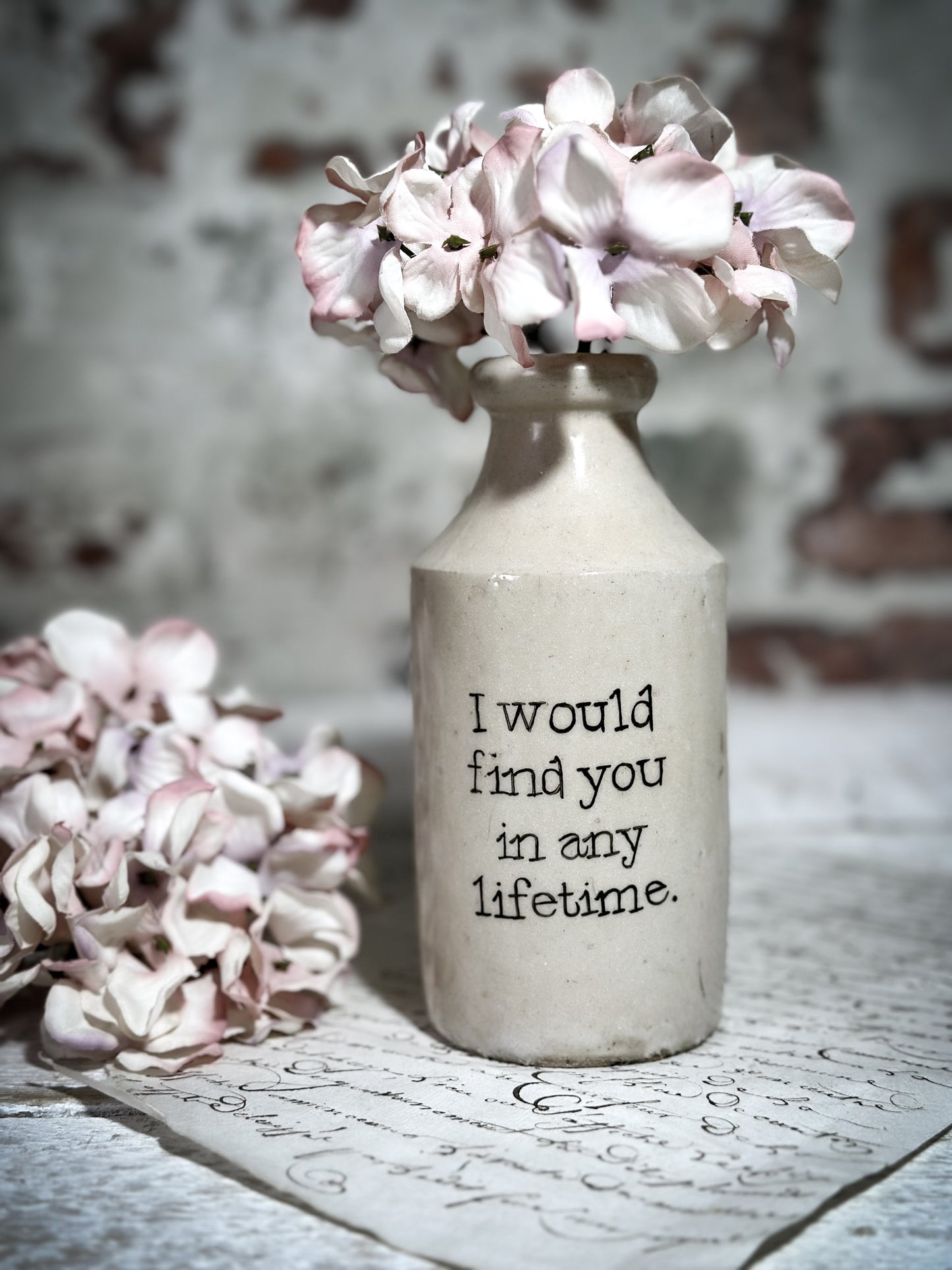 An Antique Pottery Bottle with a Hand Painted Valentine’s Day Quote