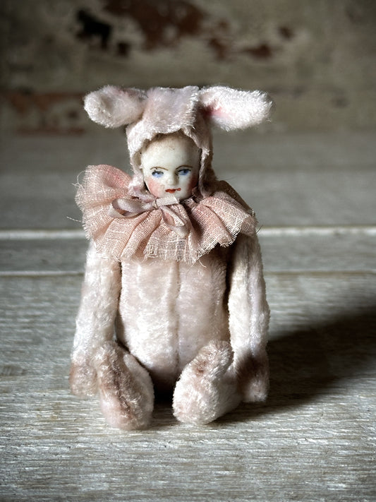 A beautiful hand made jointed collector’s doll teddy bear with bunny pyjamas