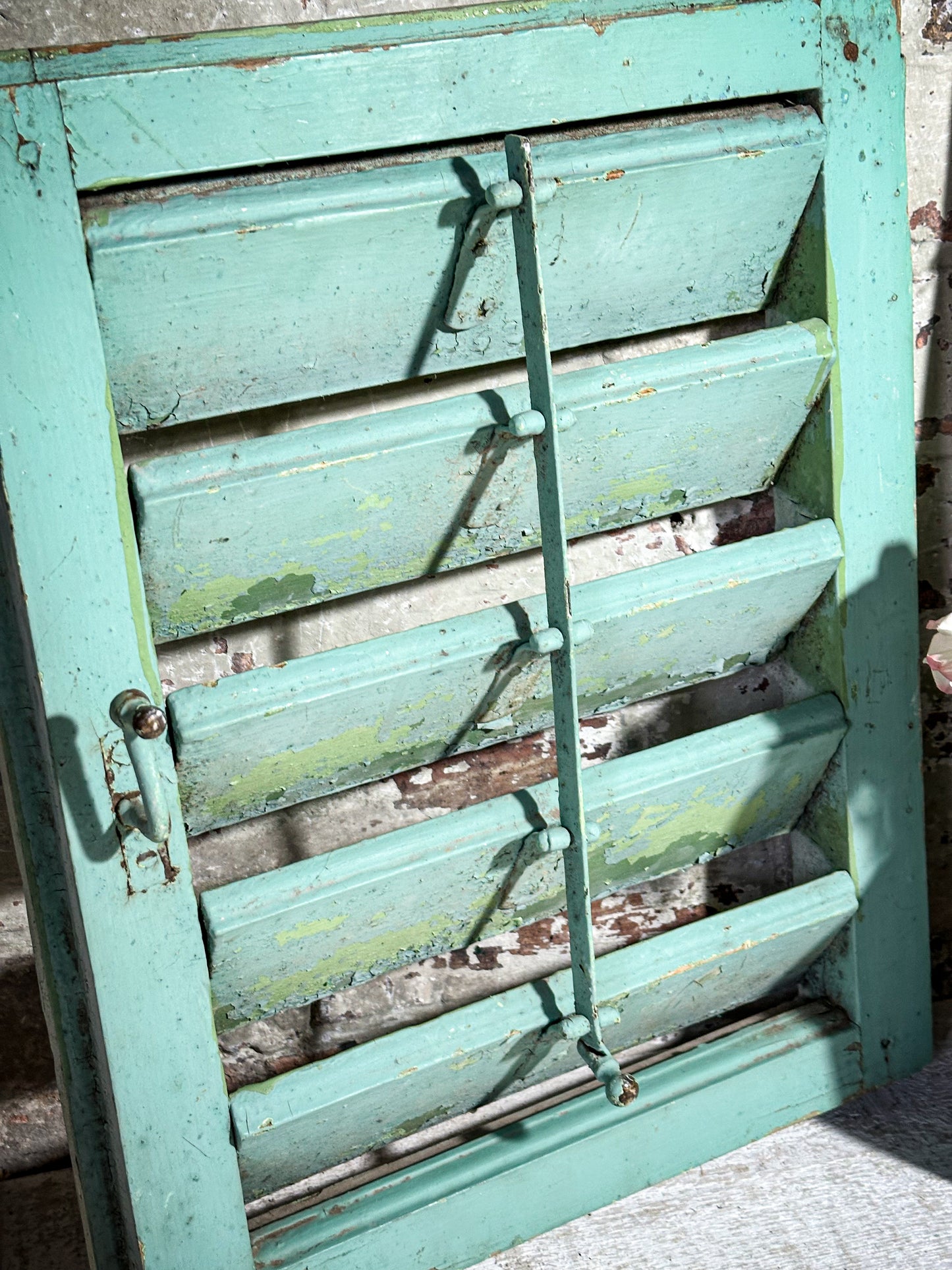 A Pair of French Green Chippy Painted Shutters