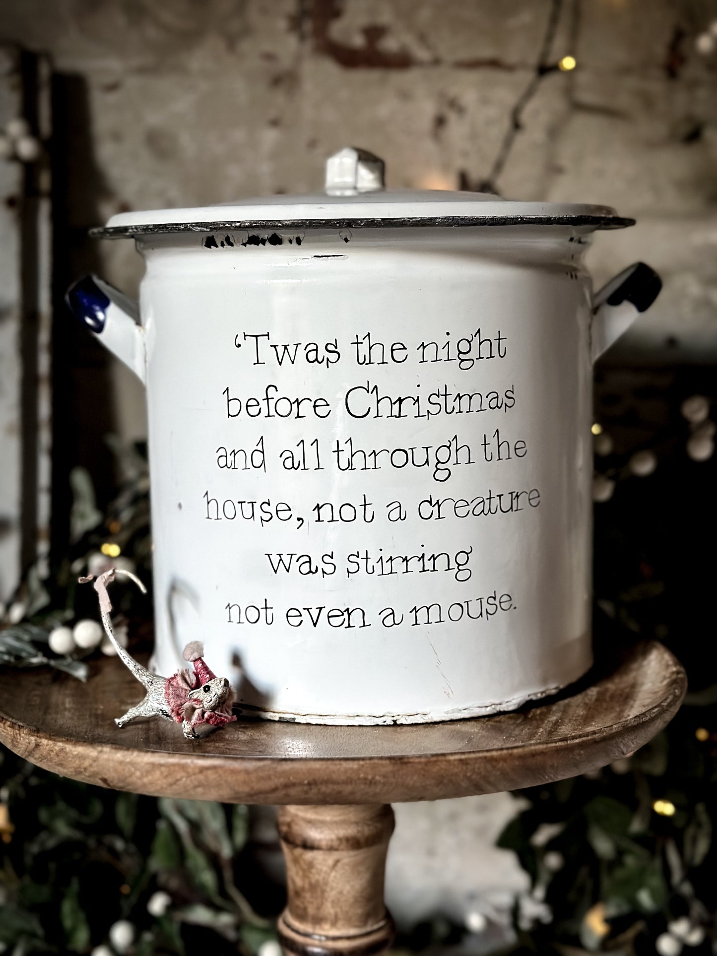 A beautiful vintage enamel canister Christmas tree tub