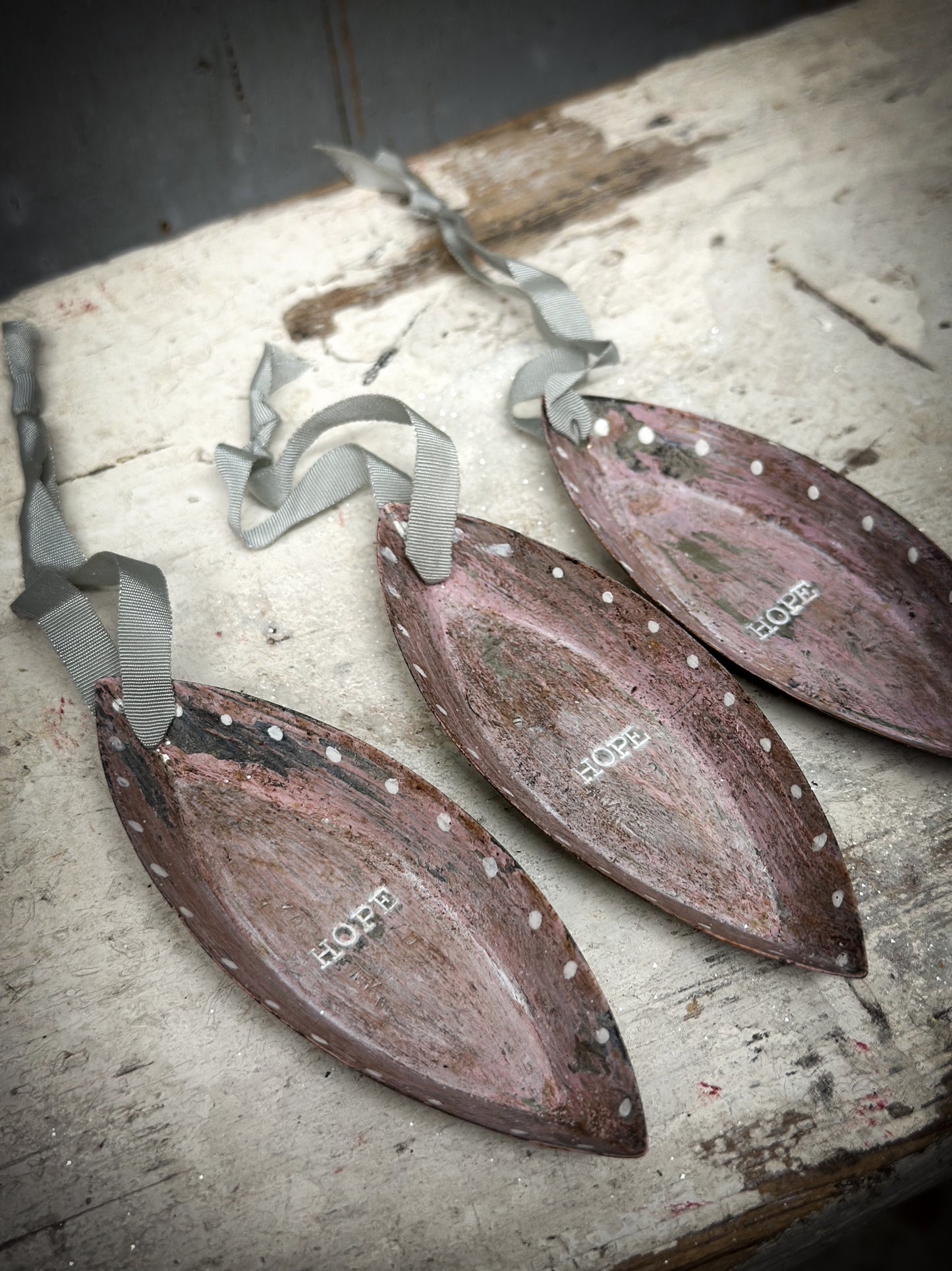 A Reworked French Patisserie Tin Christmas Decoration Stamped and Painted “Hope”