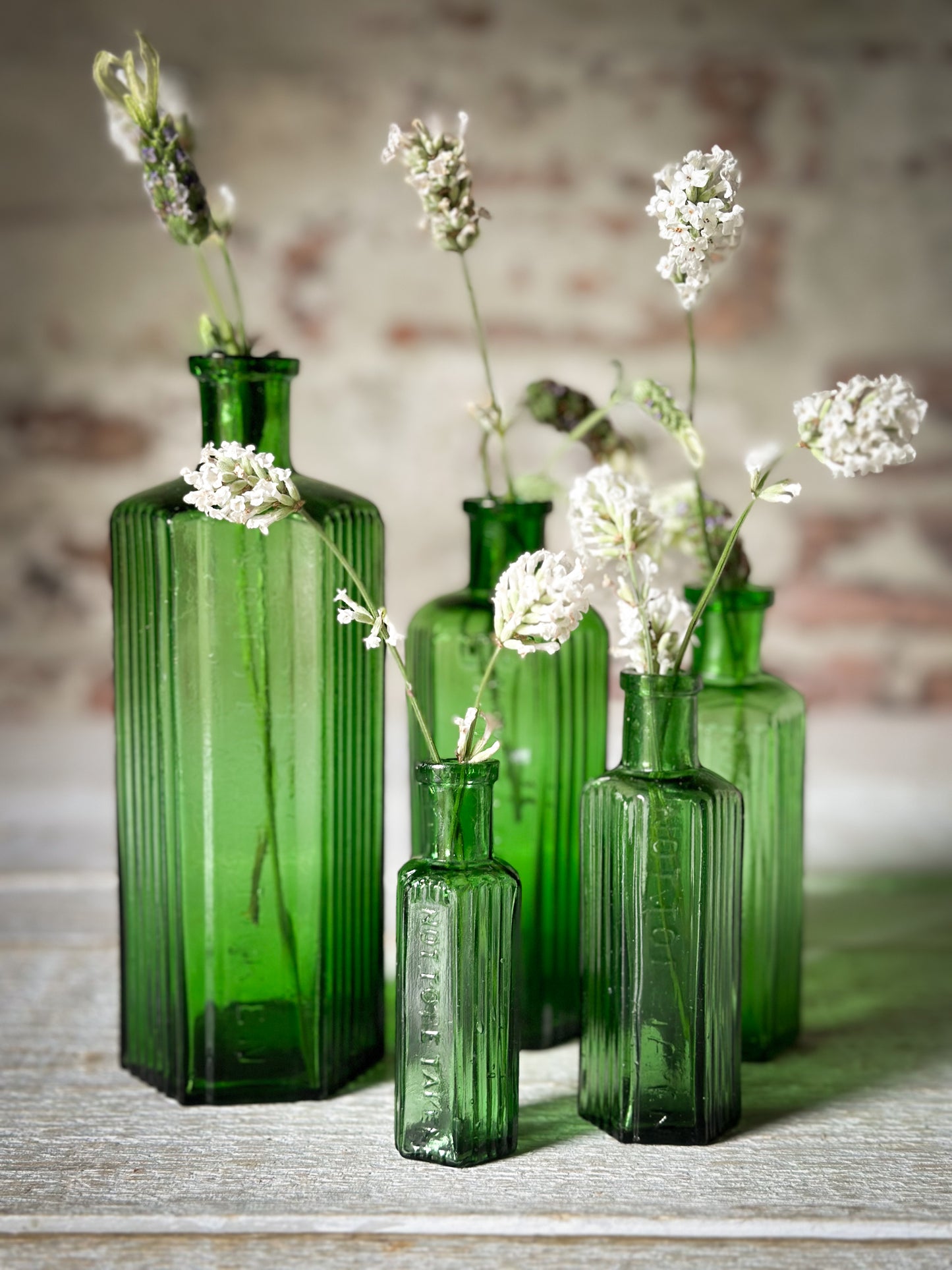 A set of Five lovely antique green poison bottles