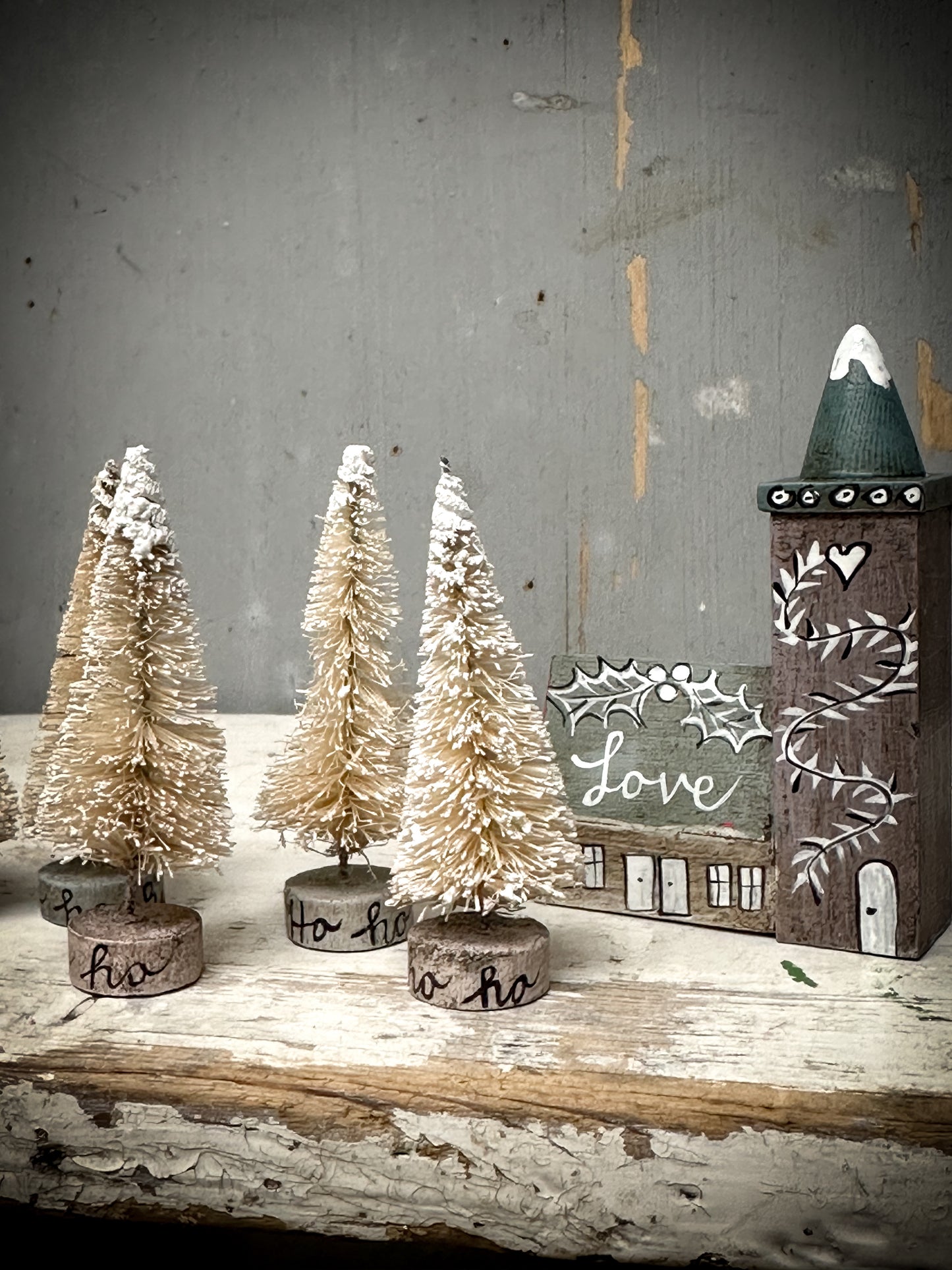 A Small Painted Bottle Brush Tree “Ho Ho Ho”