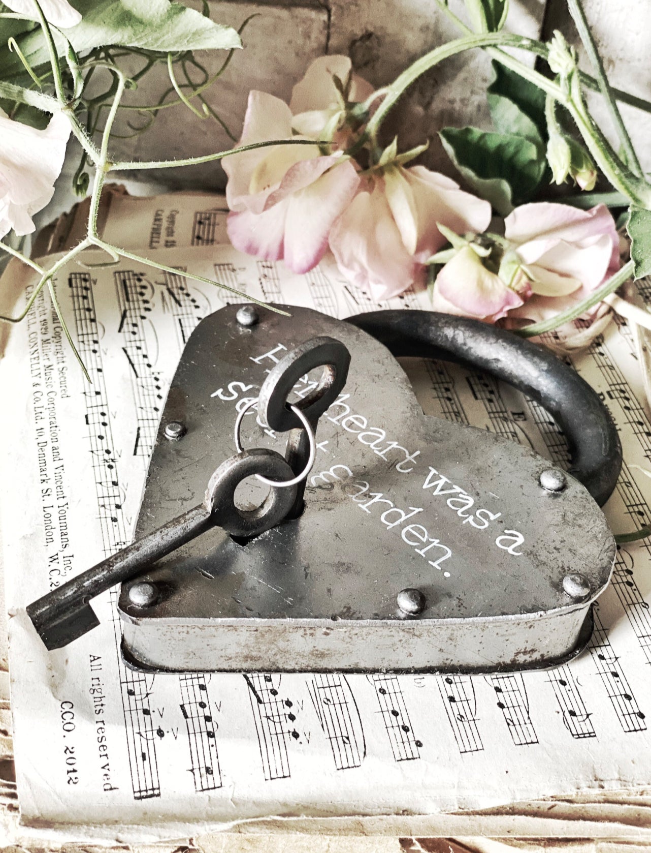 A beautiful hand painted rustic heart iron padlock with keys  "Her heart was a secret garden." A unique Valentine’s Day gift