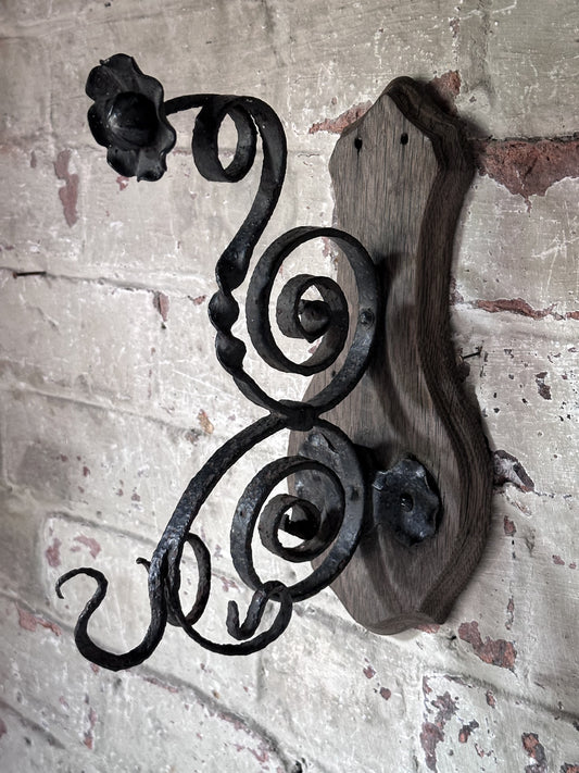 Antique Hand-Forged Wrought Iron Wall Bracket | Folk Art Scrollwork Hook on Wooden Backplate
