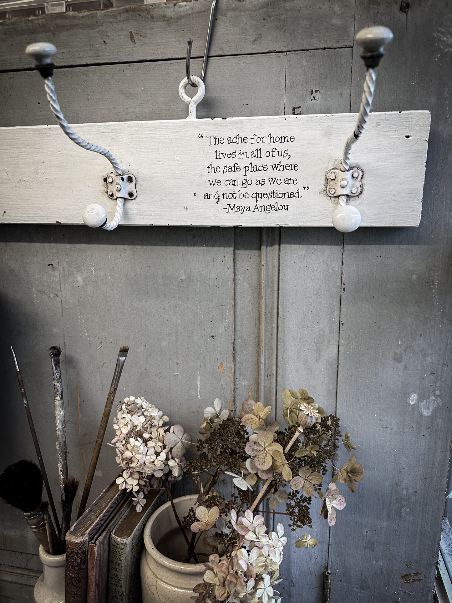 A Vintage Wooden French Coat Peg With Hand Painted Quote
