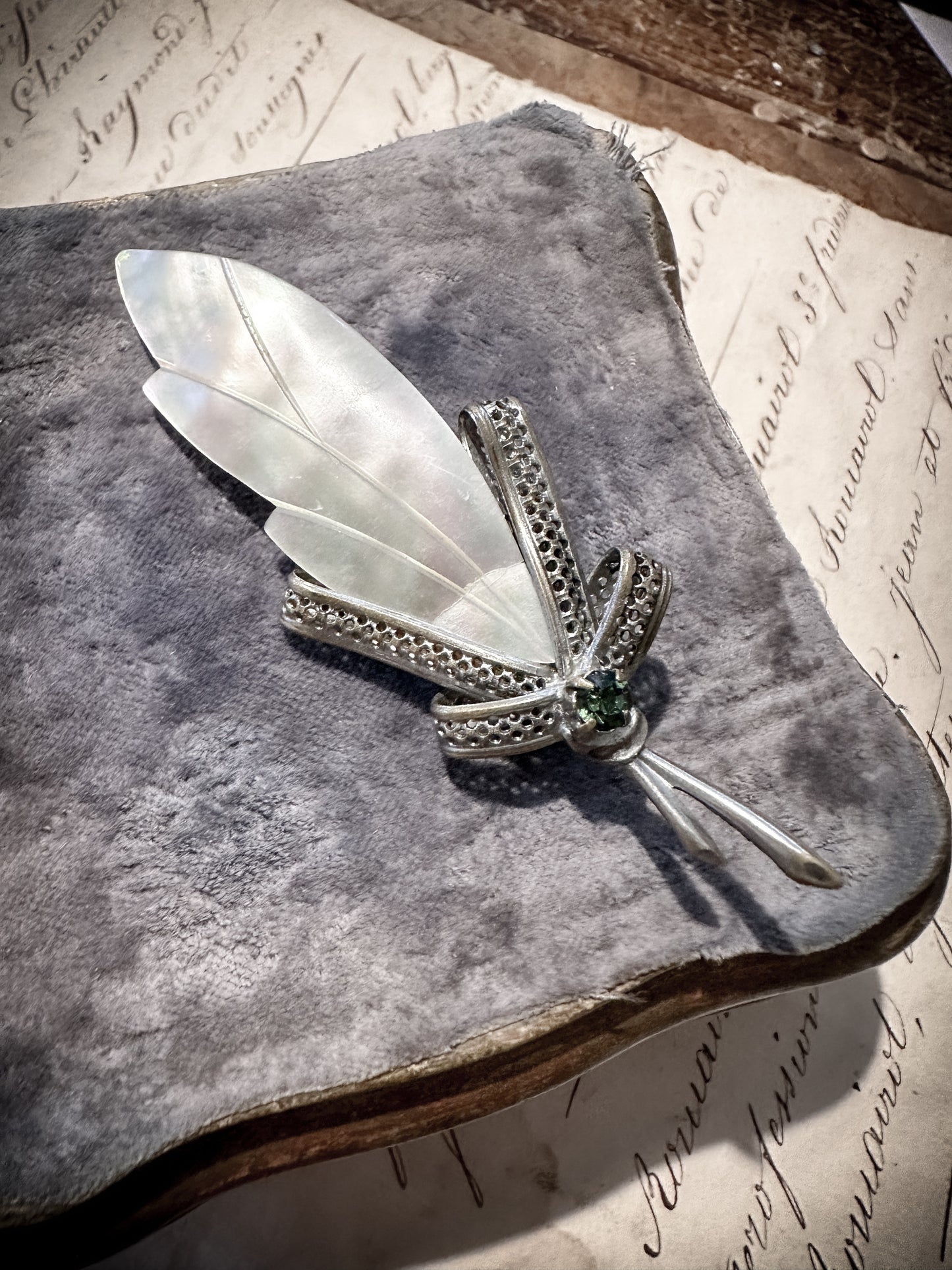 Antique mother of pearl feather brooch