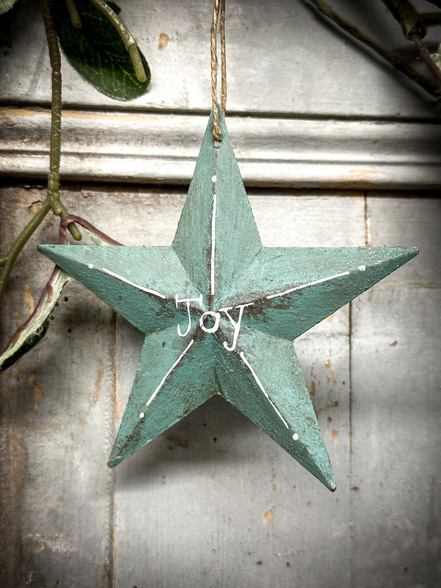 A Large Turquoise Tin Barn Star Christmas Decoration “Joy”