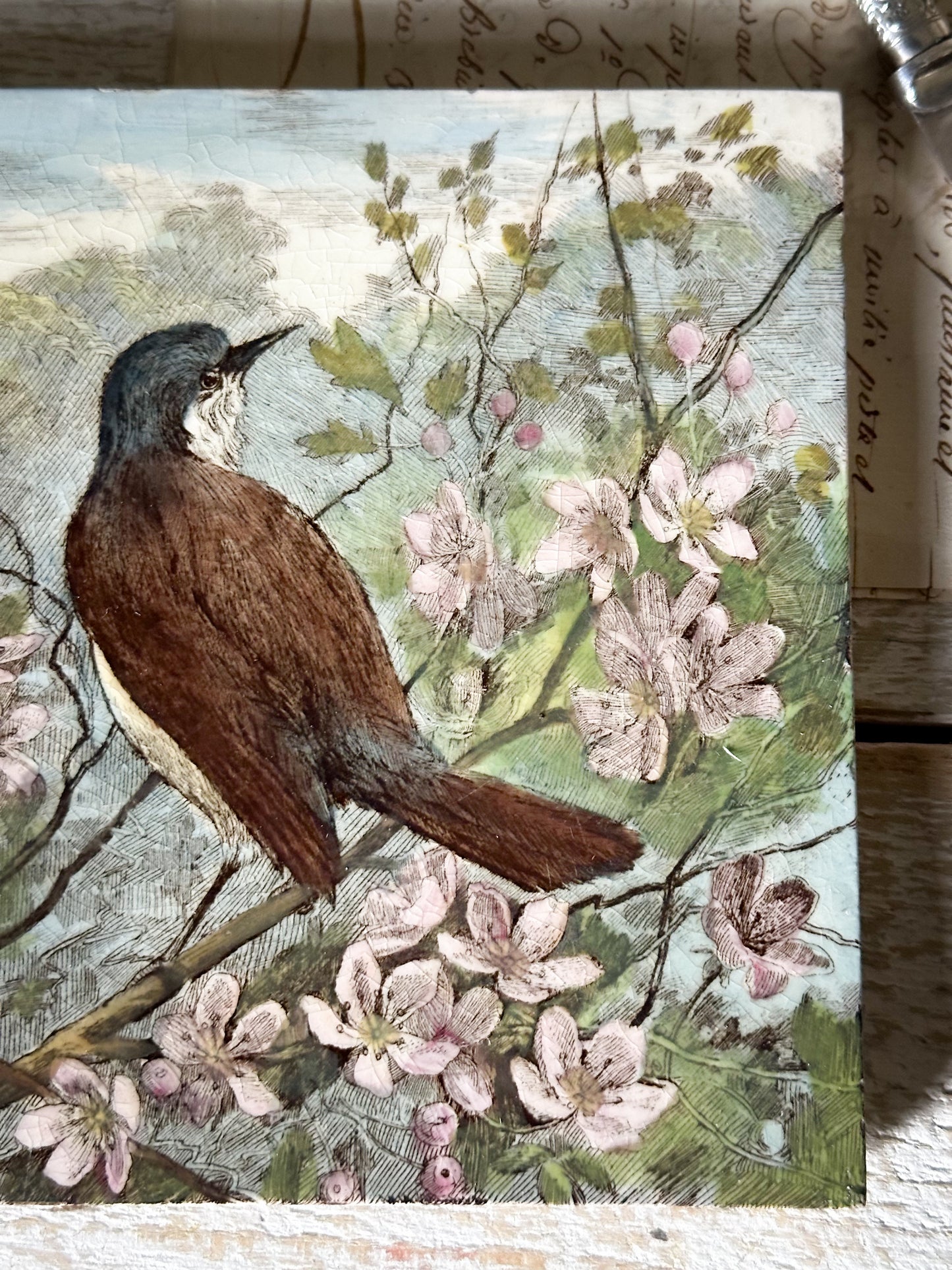 A rare collector’s Minton hand painted bird tile