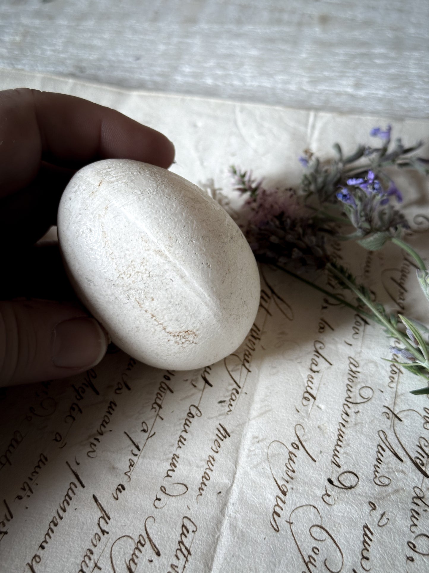 An original antique ceramic broody egg