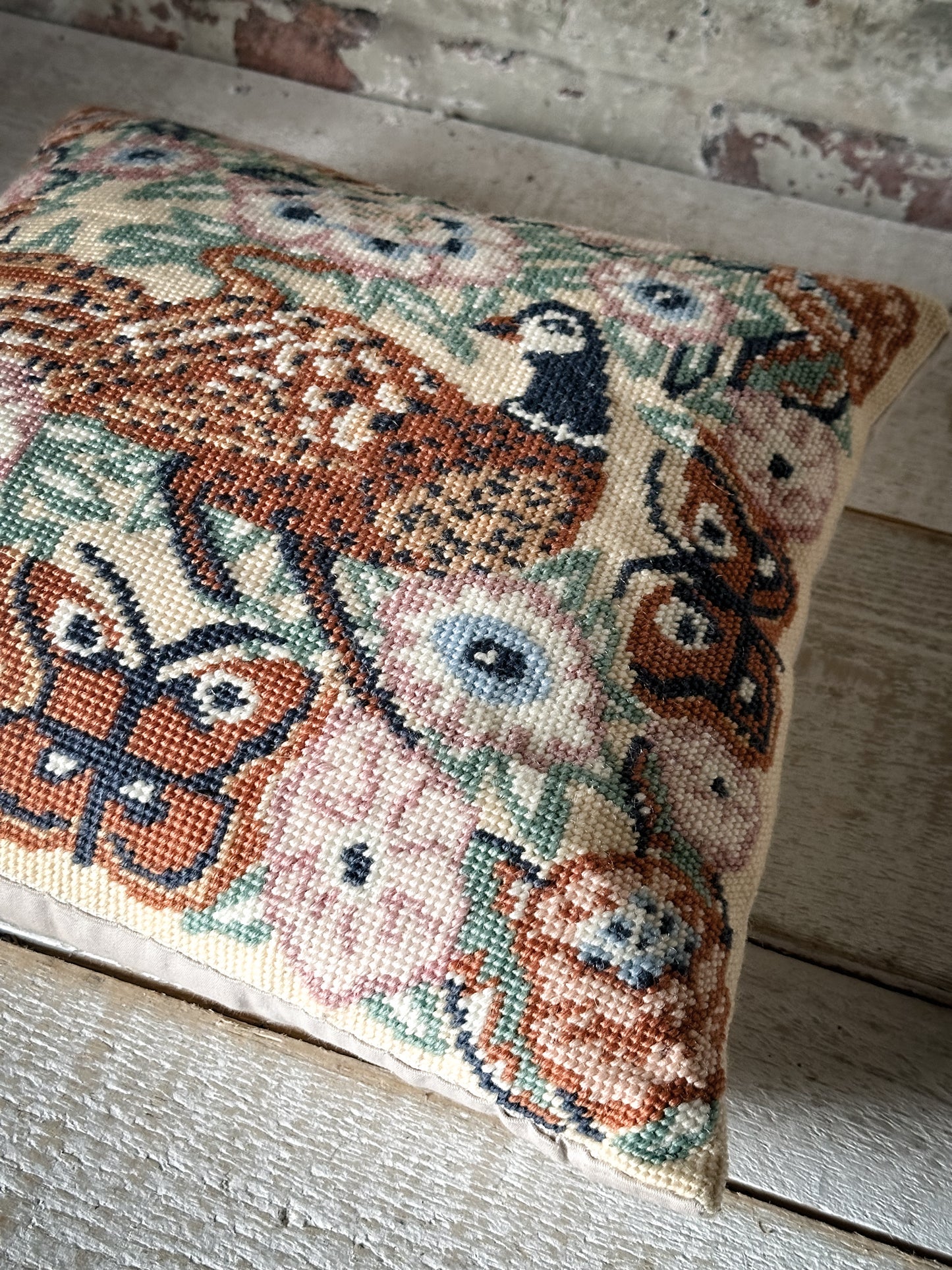 A lovely vintage wool needlepoint cushion