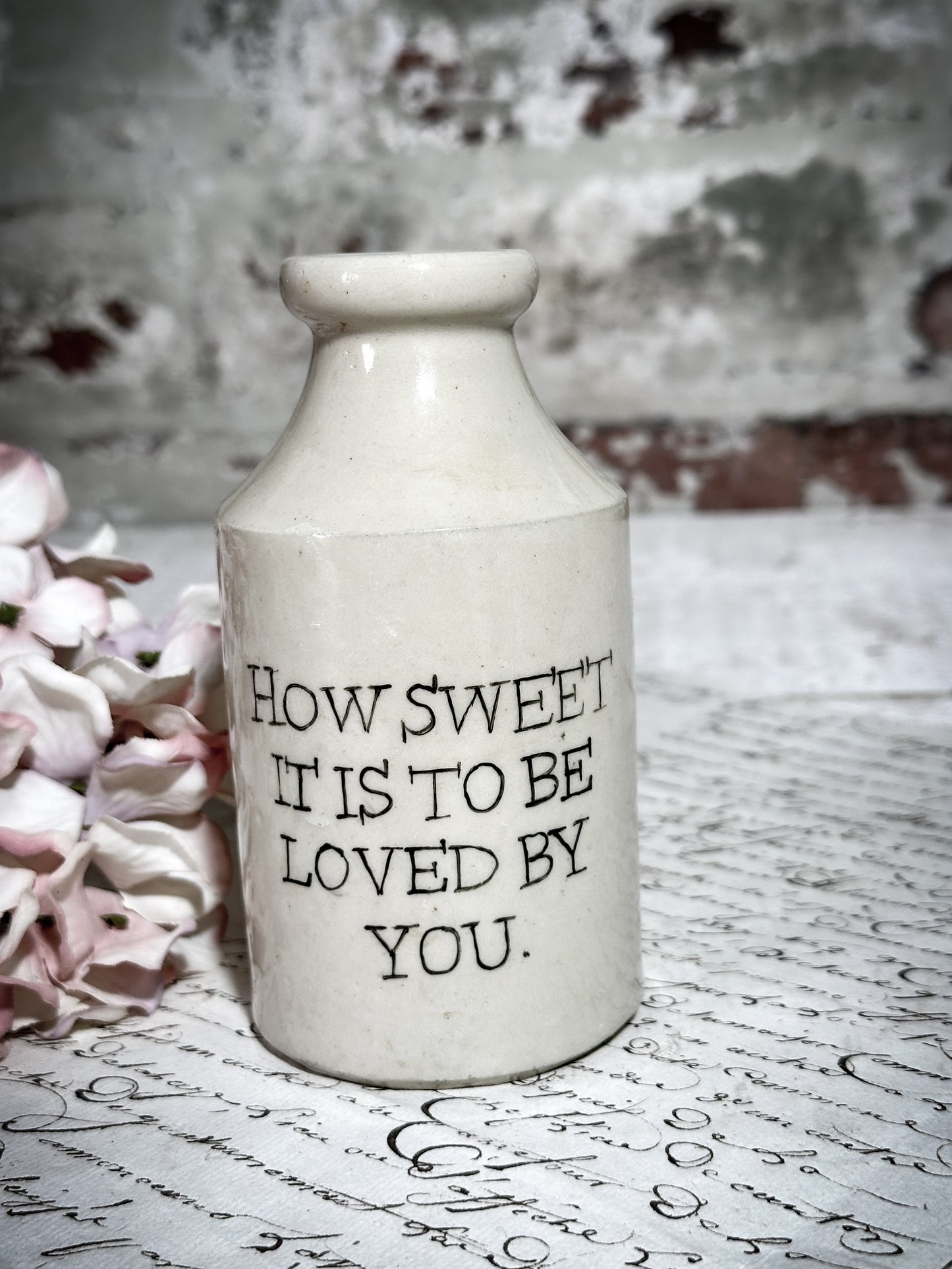 An Antique Bottle with a Hand Painted Inspirational Quote