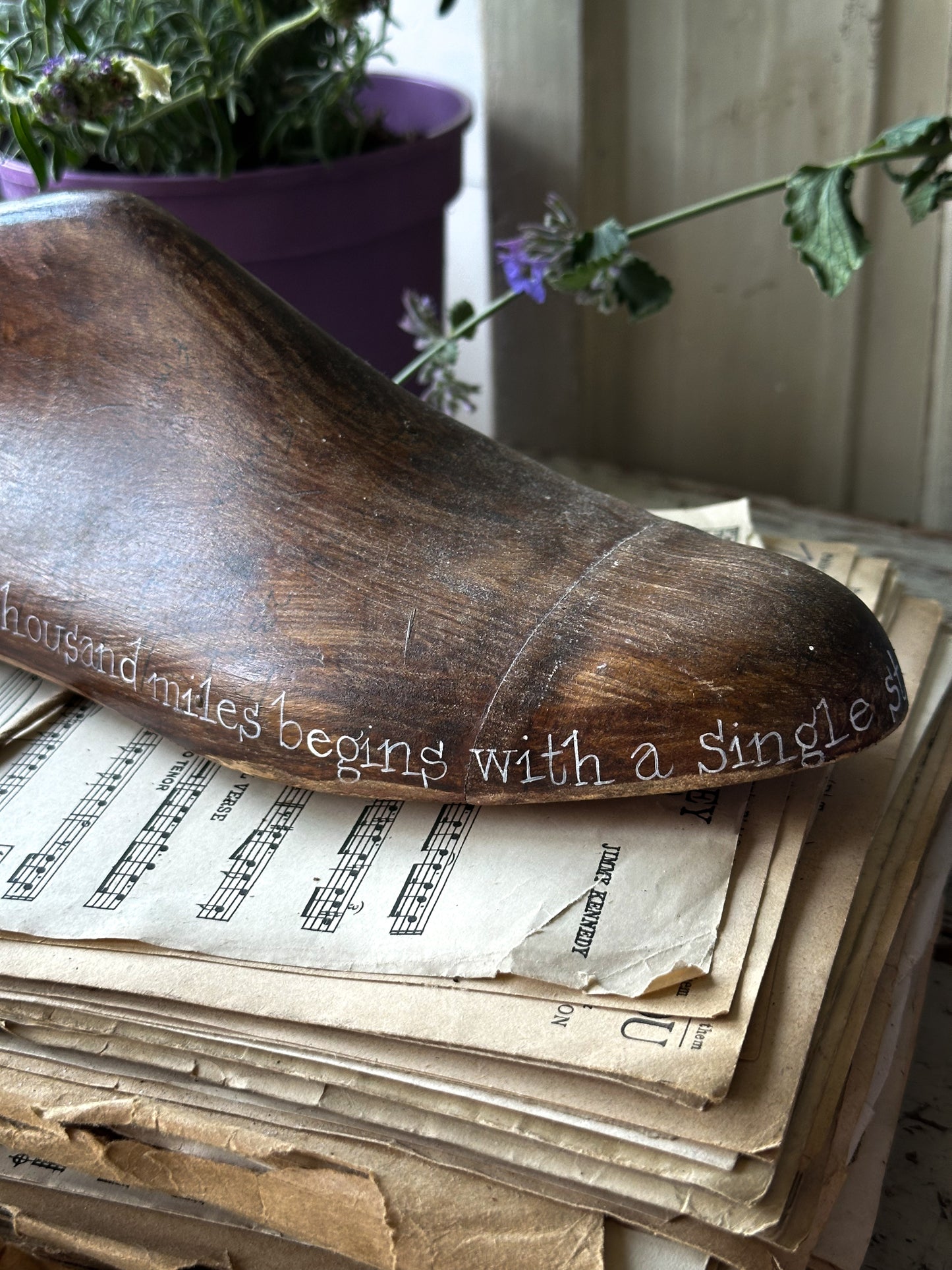 An antique wooden painted adult’s shoe last.