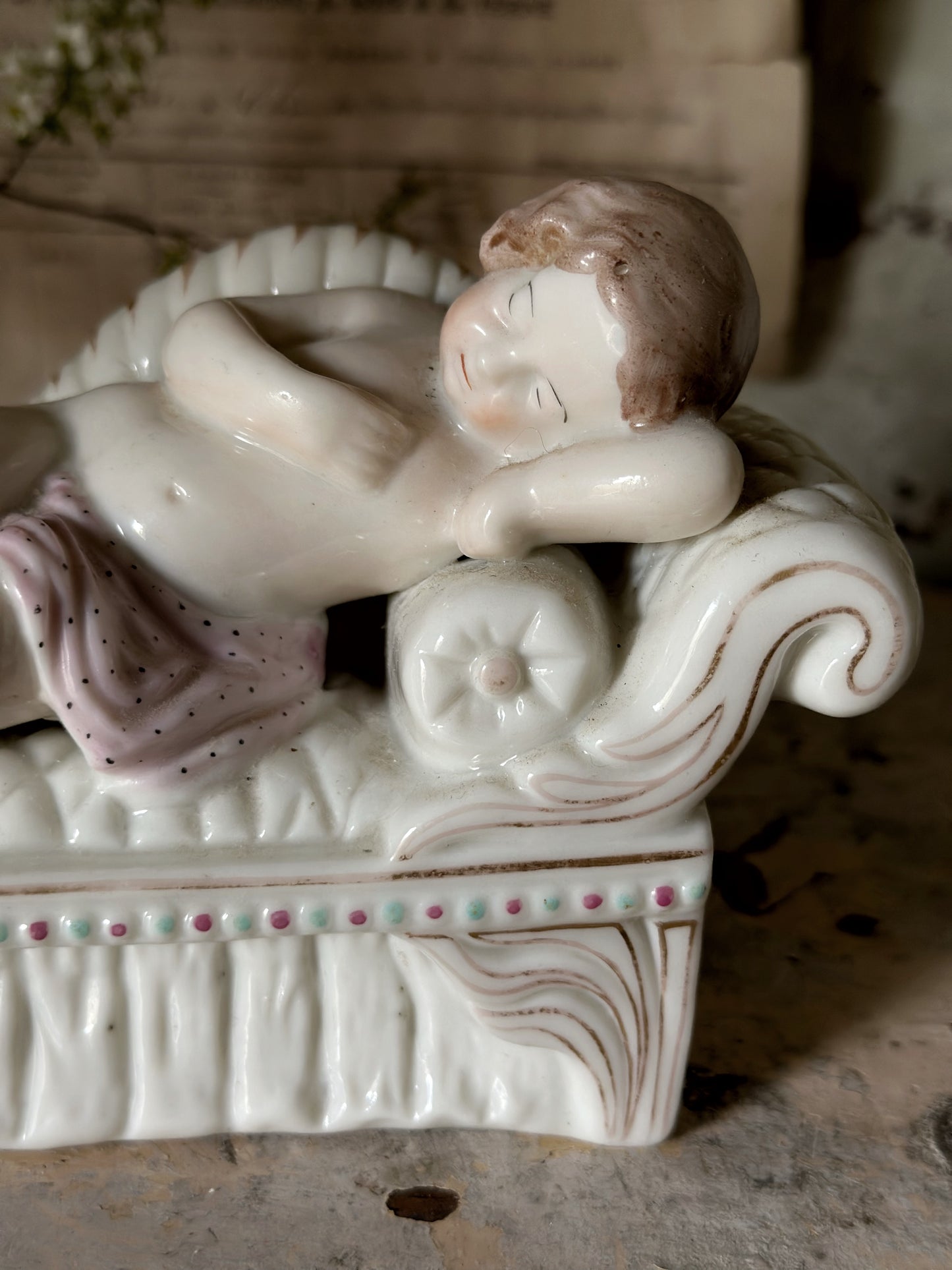 A beautiful antique Staffordshire pottery reclining lady figurine